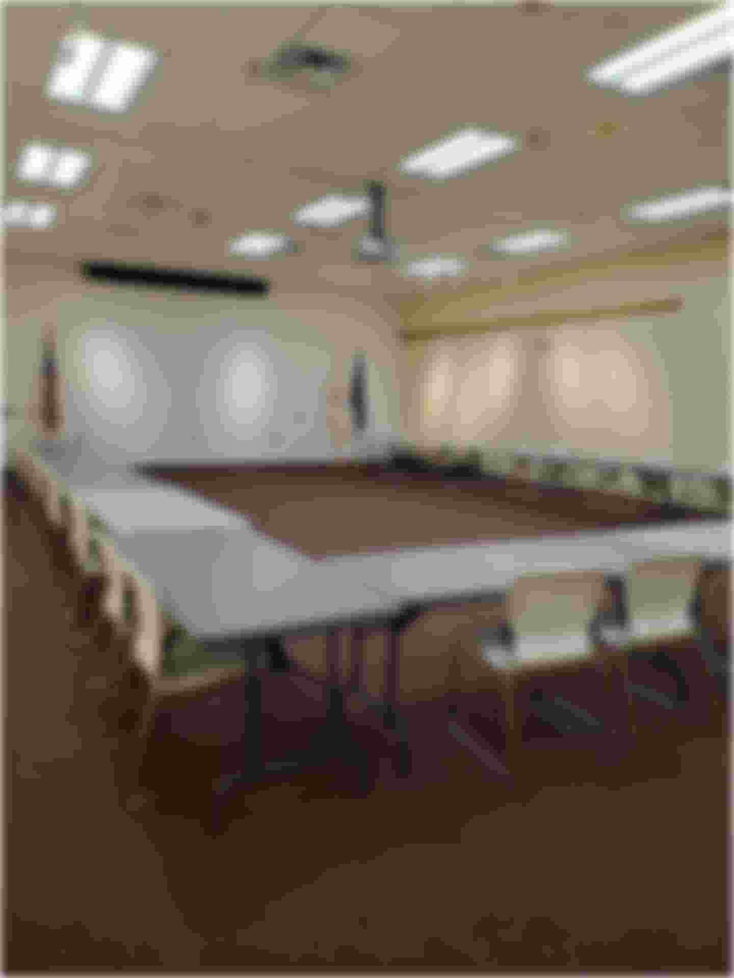 Image of the Central Library Community Room with tables and chairs set up